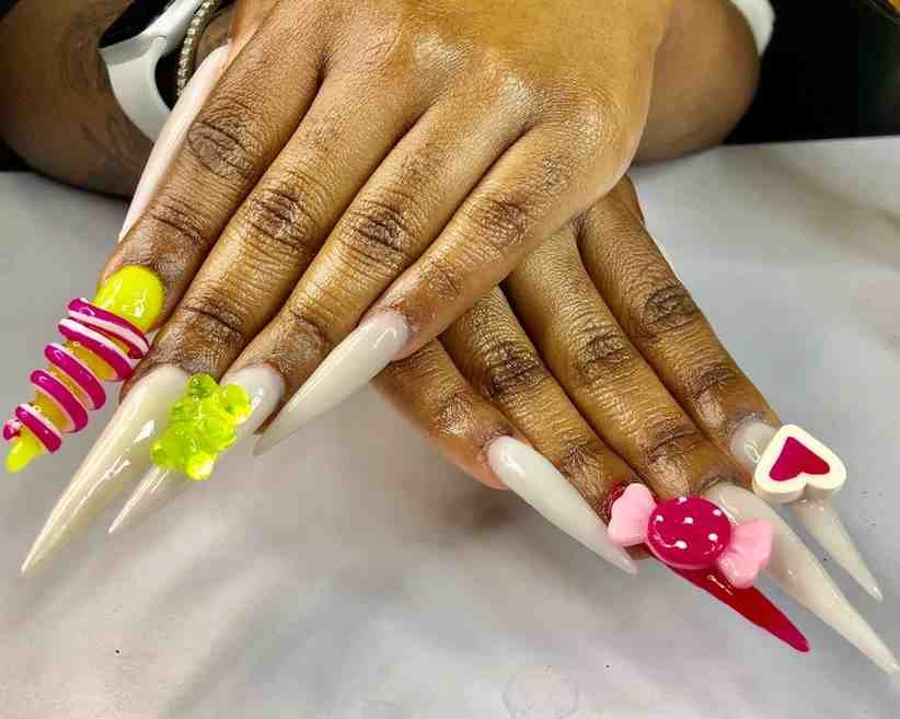 Infinite shears salon nails and spa Logo